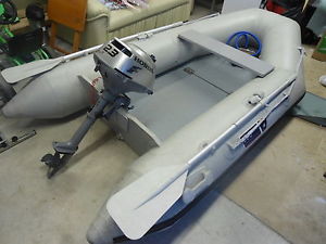 Inflatable dinghy and honda outboard