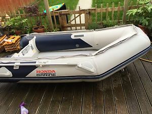 Honda Marine Honwave t24 air deck with Selva 5hp outboard