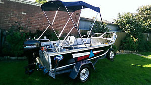 Clark 3.7m aluminium boat tinny, 15hp Mercury outboard motor and boat trailer