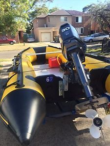 Large Inflatable Boat with new 30 Hp Yamaha on a solid trailer