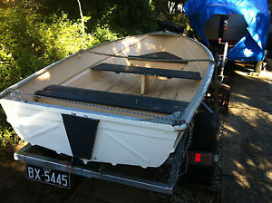 10 ft alluminium dingy and  3.5 motor .no trailer roof topper i can deliver .