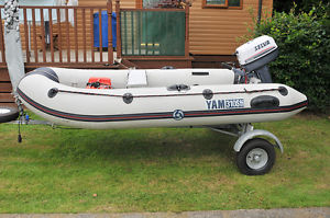 Yam 310 STi inflatable, Selva Piranha 9.9hp 4 stroke outboard & trailer