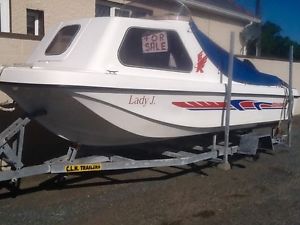 17' Sea Hawk fishing boat. With galvanized trailer and two motors plus lots more