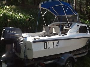 For sale ...A Savage Tasman half cabin boat 1986