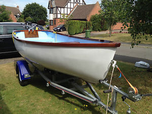 Dinghy12 ft,Honda 5 HP ,Trailer, used 5 times since.purchased new 18 months ago