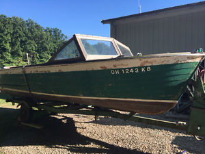 1969 Lyman vintage wooden boat. 4 cylinder original motor and original trailer.