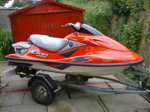 KAWASAKI ULTRA 150 JETSKI,46-HOURS,ROLLER TRAILER,REMARKABLE CONDITION NEAR MINT