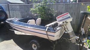 speedboat with trailer and outboard