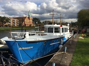 liveaboard converted ex-police boat with full res. mooring near STAINES