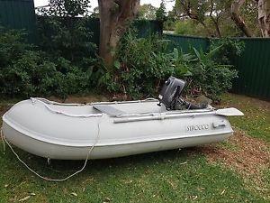 Inflatable boat with motor