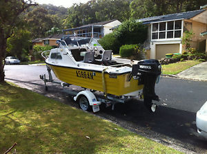 Reefcraft 4.6MTR Fibreglasss Half Cabin Runabout with 40H.P. Engine.