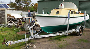 Classic Huon Pine Fishing Boat and trailer. Wooden Boat. Half Cabin