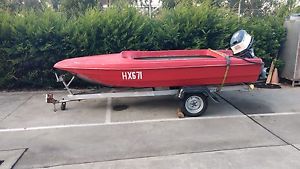 project 15 ft boat(approx),trailer,evinrude 40 hp tiller steer outboard motor.