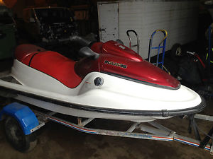 Polaris Jet Ski in need of TLC with cover and Snipe Trailer