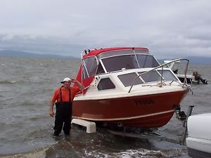 CARRIBEAN CRESTCUTTER  with 115 Johnson Outboard