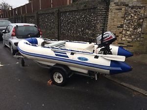 Inflatable boat for inshore fishing on a trailer