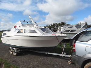 21ft DOUBLE CABIN CRUISERWITH ELECTRIC START OUTBOARD TWIN AXLE TRAILE