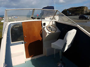 Clean Shetland 570 with mariner 60hp outboard and trailer