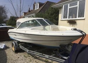 power boat ... sea ray .. trailer .. engine ..mercury ..inboard ..trailer ..boat