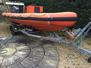 5.2m RIB Boat with 75HP Mariner and Rapide Roller 7 trailer.