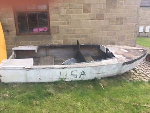 Old wooden speedboat, possibly for restoration