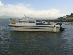 18 FT BOAT WITH CABIN 60 HP 2 STROKE YAMAHA OUTBOARD ENGINE BRAKED ROAD TRAILER