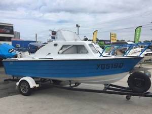 Savage Pacific Half Cabin boat fitted and 70hp Johnson Outboard Motor on Trailer