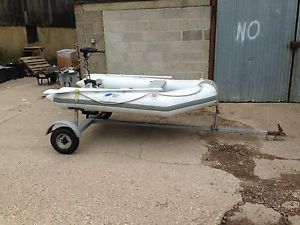 inflatable c/w trailer & elec outboard