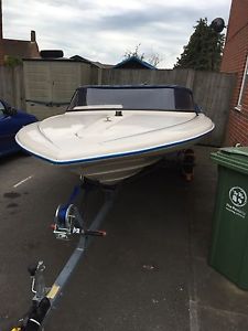 Speedboat with trailer and 60hp Johnson outboard