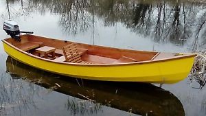 Dinghy , motor canoe and trailer plus engine with only 7hrs use.