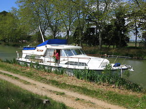 Motor boat in South of France moored Canal du Midi Herbert Woods "Ocean 38"