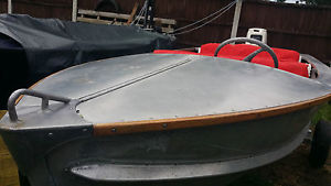 Pearly Miss. Vintage aluminium speedboat with 18HP Johnson Outboard engine.